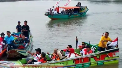 Kapolsek AKP Hermansyah Pimpin Giat Pengamanan Lomba Bidar Mini di Kecamatan Tanjung Raja