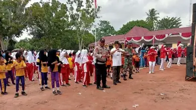 Personil Polsek Tanjung Raja Giat Monitoring dan Lakukan Pengamanan Pembukaan Porcam II di Kecamatan Rantau Panjang