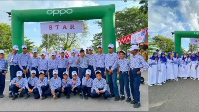 Peserta Gerak Jalan SMP Aisyah Bukulasa, Desa Bukit Durian Kc. Oba Utara. Hut Maluku Utara Ke-24.