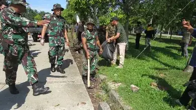 Antisipasi Banjir & Wabah Penyakit, Kodim 0402/OKI Gelar Karya Bakti Bersihkan Selokan Air