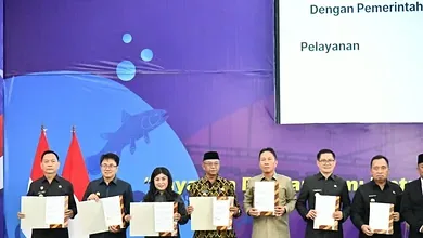 Pemkab Boltim Terima Penghargaan dari Menteri Hukum RI