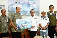 BPJS Kesehatan Serahkan 38.750 Masker untuk Tanah Datar